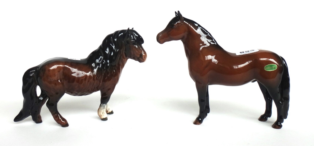 A Beswick Dartmoor pony No.1642, two Shetland ponies and one smaller Shetland pony, brown gloss,