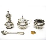 A silver octagonal three piece cruet set, comprising; a mustard pot, a salt and a pepperette,