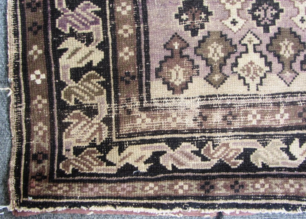 A Shirvan rug, Caucasian, the dark indigo field with three medallions supported by single Talish - Image 5 of 5