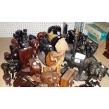 A large quantity of carved hardwood and other models of elephants.