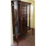 A mahogany and beech wood 'D' shaped display cabinet, made-up, the door enclosing two glass shelves,