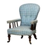 A Victorian satin birch framed open arm easy chair on turned and barleytwist supports,