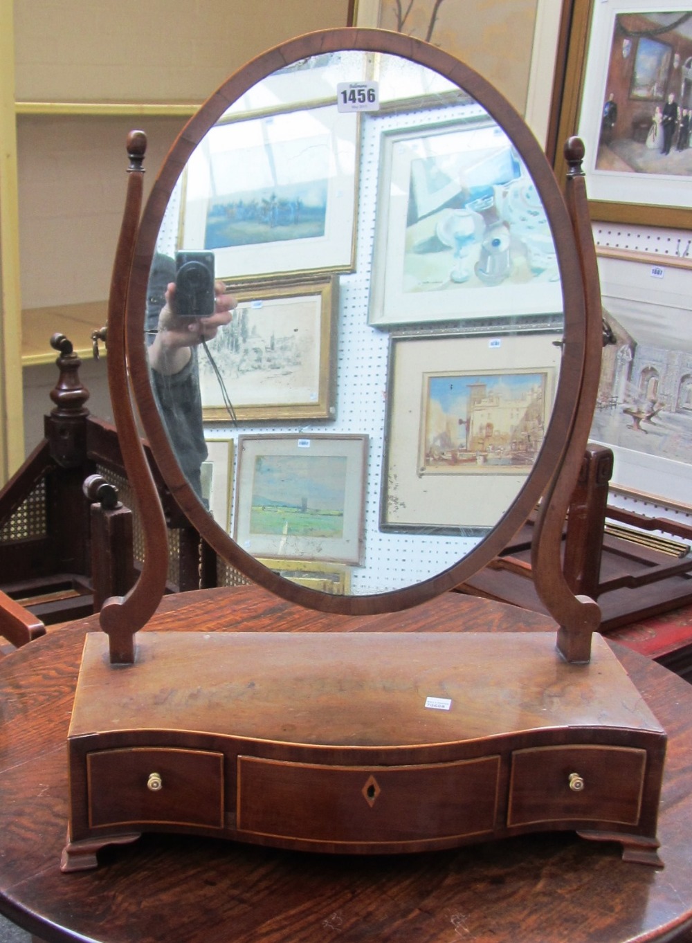 A mid 18th century parcel gilt walnut pier glass, 39cm wide x 69cm high,