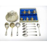 Silver, comprising; a King's pattern caddy spoon, with a scallop shell shaped bowl, London 1900,