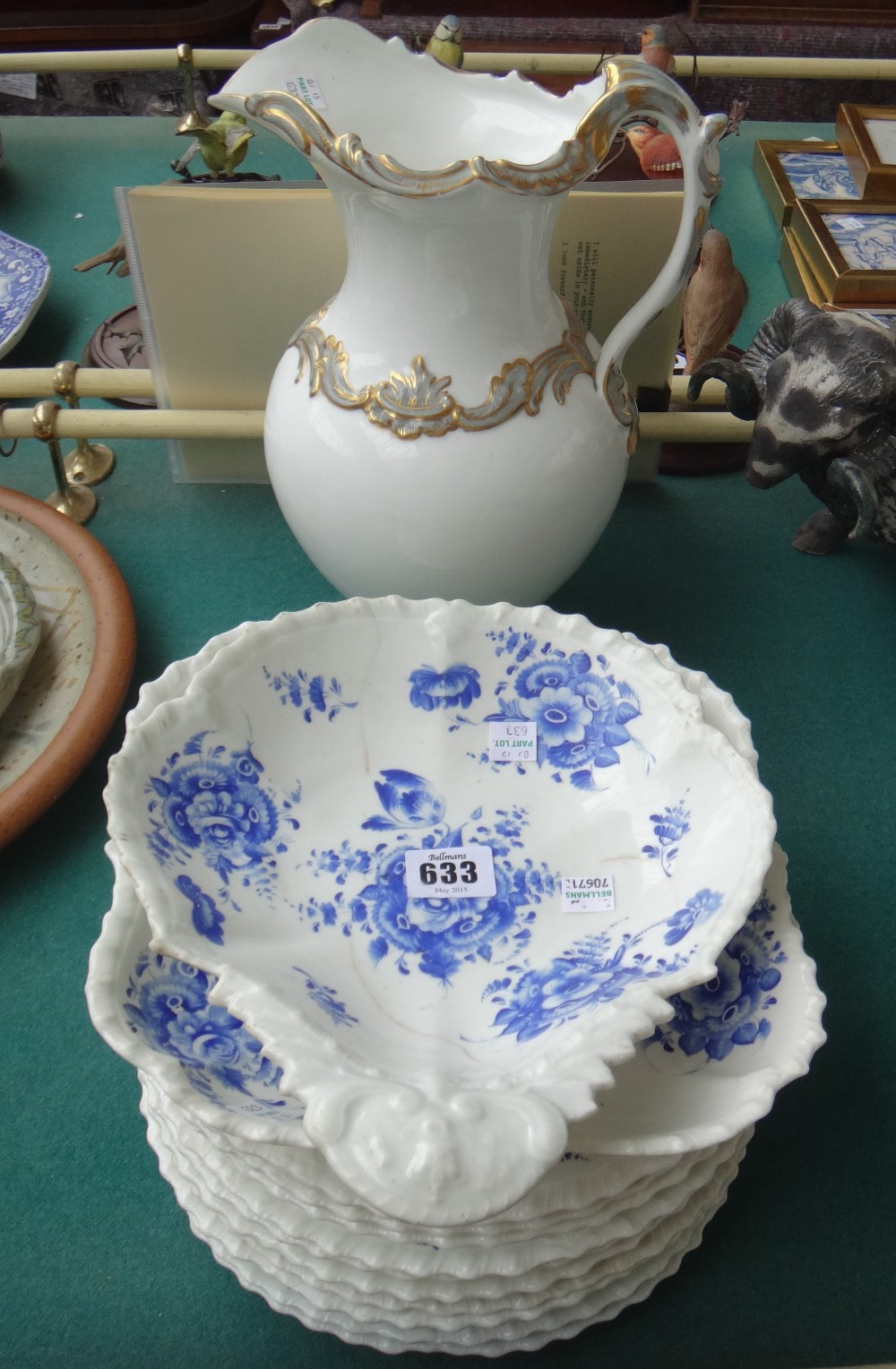 An English porcelain part dessert service circa 1830, painted with flower sprays in blue monochrome, - Image 2 of 2