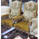 A pair of 20th century high back open armchairs with silvered frames on squat cabriole supports.