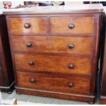 A Victorian mahogany chest of two short and three long graduated drawers, on plinth base,