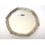 A silver salver, London 1894, makers mark J.