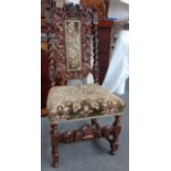 A set of six carved oak dining chairs of late 17th century design and a similar pair with Prince of