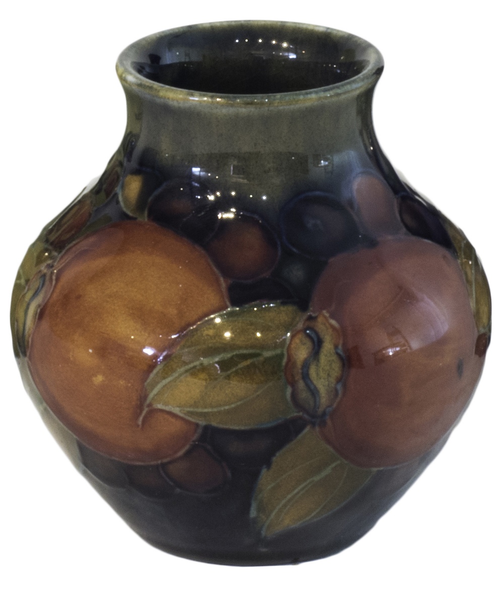 A Moorcroft pottery vase decorated in the Pomegranate pattern, circa 1930,