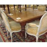 A Victorian mahogany rectangular extending dining table on six turned supports,
