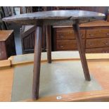 A George III burr elm oval slab table on three later staked oak supports, 76cm wide.