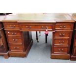 A 19th century walnut breakfront nine drawer pedestal desk, 122cm wide.