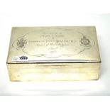 A silver cigar casket, London 1929, by Aspreys, plain with slightly domed solid cover,