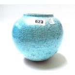 A studio pottery vase by Ethel Taylor decorated in duck egg blue with a craquelure ground,