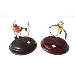 Eight Coalport porcelain and metal mounted birds from The Heritage Collection, comprising Robin,