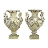 A pair of reconstituted stone three part garden urns of Louis XVI design,