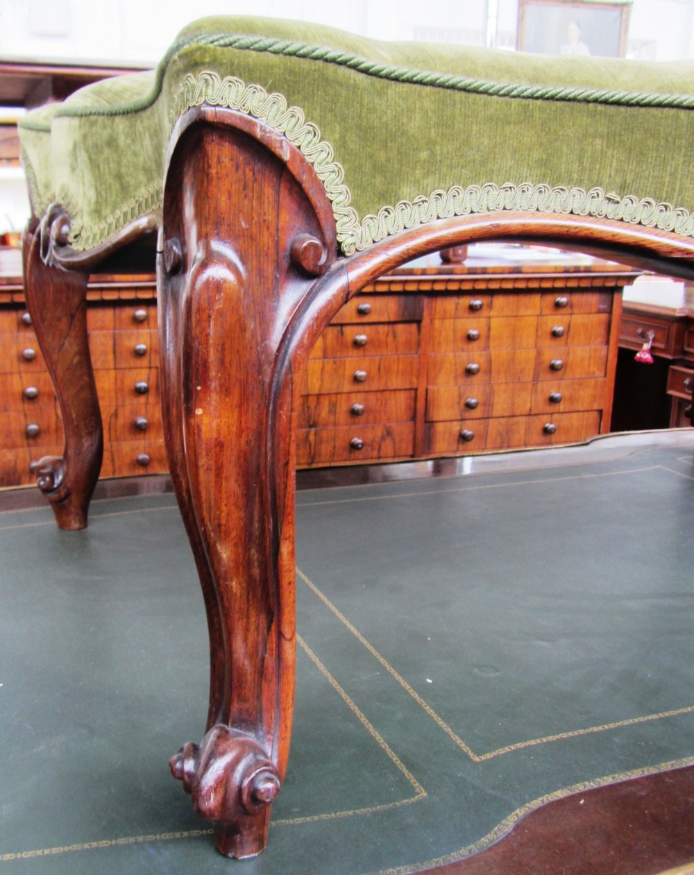 An early Victorian rosewood framed footstool of serpentine outline on cabriole supports, - Image 2 of 2