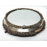 A silver plate mirrored plateau base, circa 1900 by Elkington & Co,