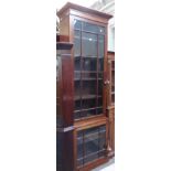 A George III and later tall narrow mahogany double height glazed bookcase, 80cm wide x 245cm high.