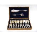 A set of twelve pairs of plated King's pattern fish knives and forks,