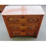 A small Victorian walnut three drawer chest with leaf carved handles, 80cm wide.