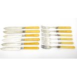 Three pairs of Victorian silver fish knives and forks, with ivory handles,