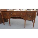 A George III inlaid mahogany bowfront sideboard on tapering square supports, 186cm wide.