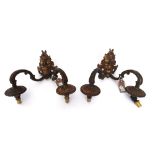 A set of four Continental bronze two branch wall lights, 19th century,