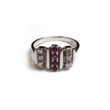 A white gold, ruby and diamond set ring,