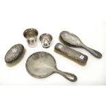 Silver mounted dressing table wares, comprising; a hand mirror, Birmingham 1908,