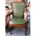 An early 18th century style walnut open armchair with scroll back and bow seat,