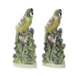 Two similar Staffordshire pottery figures of `roc' birds, mid 19th century,