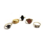 A 9ct gold and goldstone set signet ring, a 9ct gold and colourless gem set ring,