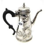 A European silver coffee pot, of tapering cylindrical form, embossed with rococo scrolls,