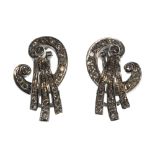 A pair of diamond set earclips, each in a scroll and fanned design,