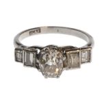 A platinum and diamond set ring,