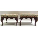 A pair of 19th century inlaid mahogany footstools on cabriole supports, 38cm wide.