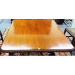 A George III mahogany rectangular snap top centre table on four downswept supports, 139cm x 125cm.