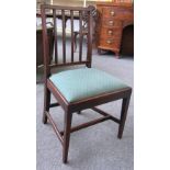 A set of six George III square back dining chairs on tapering square supports.