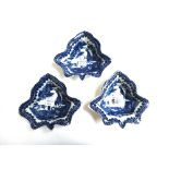Four late 18th century blue and white Caughley porcelain leaf shape dishes,