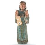 A polychrome decorated carved wooden figure, early 19th century,
