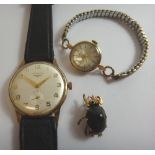 A lady's 9ct gold circular cased Garrard wristwatch,