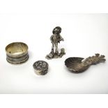 Silver, comprising; a model of a standing chimney sweep, London 1978, a tea caddy spoon,