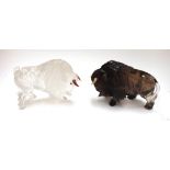 Two carved hardstone Buffalo of Fabergé design, 20th century, with coloured horns, (a.f.) 12.