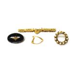 A Victorian gold and seed pearl set oval black onyx brooch,