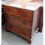 An 18th century mahogany chest of three long graduated drawers on bracket feet, 79cm wide.