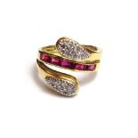 An 18ct gold, ruby and diamond set ring,