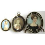 Mid-19th Century English school portrait miniature of a young woman wearing a black dress set in an