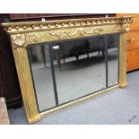 A Regency gilt framed triple plate overmantel mirror with ball mounted frieze and split reeded